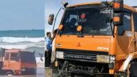 Evakuasi truk trailer terjebak air laut pasang di Pantai Bagedur Lebak menggunakan ekskavator