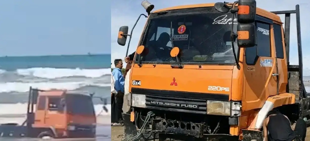 Evakuasi truk trailer terjebak air laut pasang di Pantai Bagedur Lebak menggunakan ekskavator